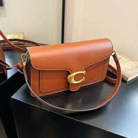 Bolsa feminina de couro e plutônio